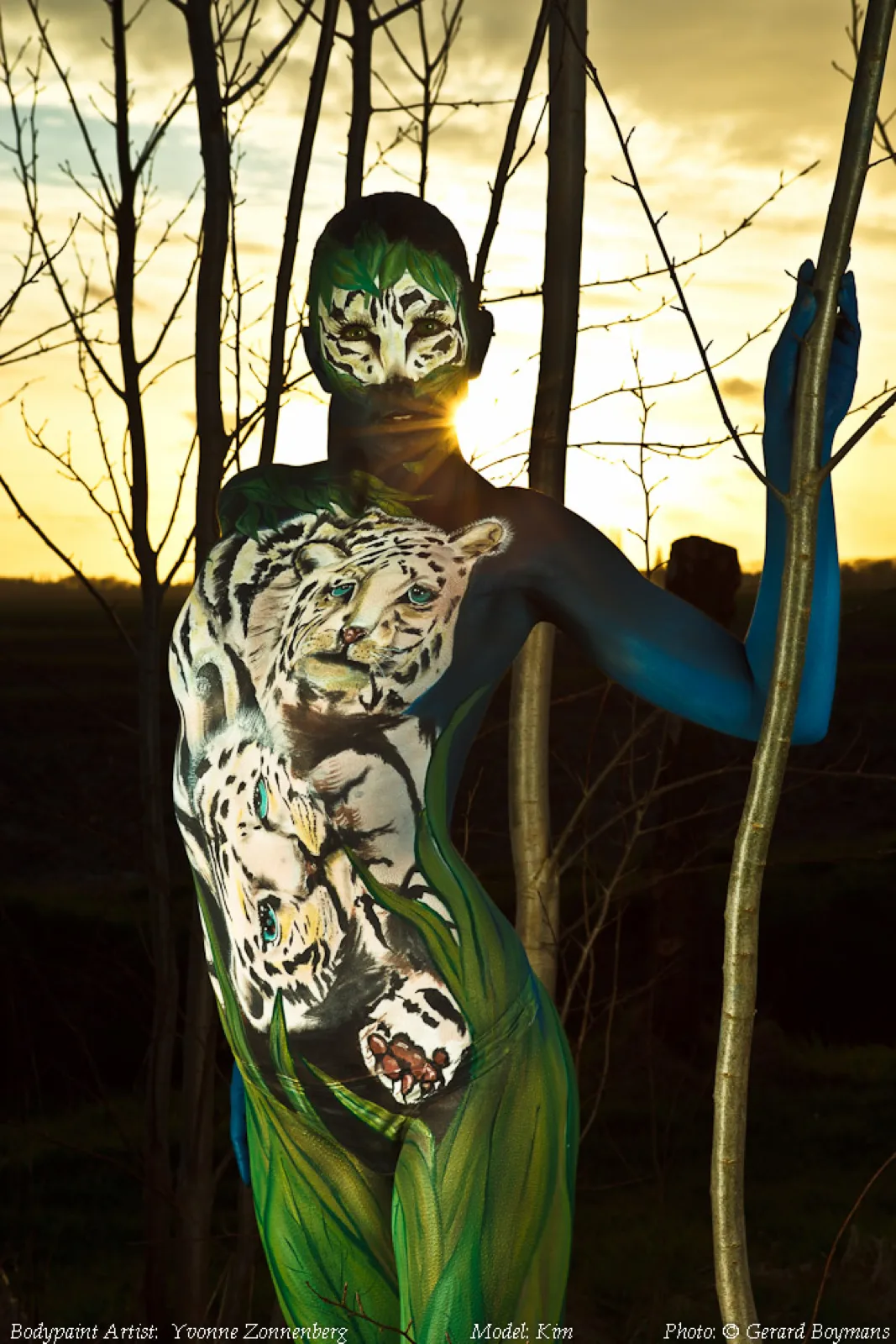 Sneeuwluipaard bodypaint bij zonsondergang, wedstrijdwerk