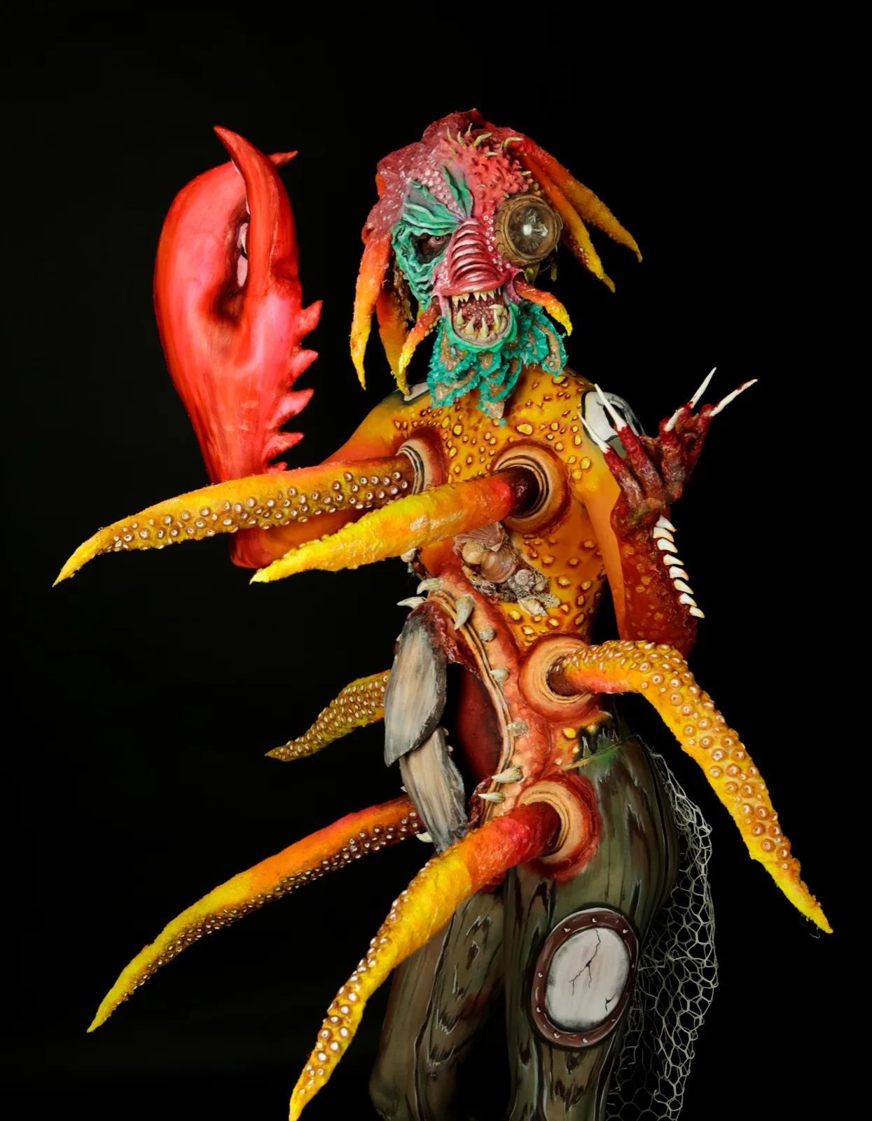 zeemonster met latex tentakels en schaar